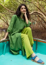 Enfärgad trikåbyxa i ekologisk bomull - kiwi