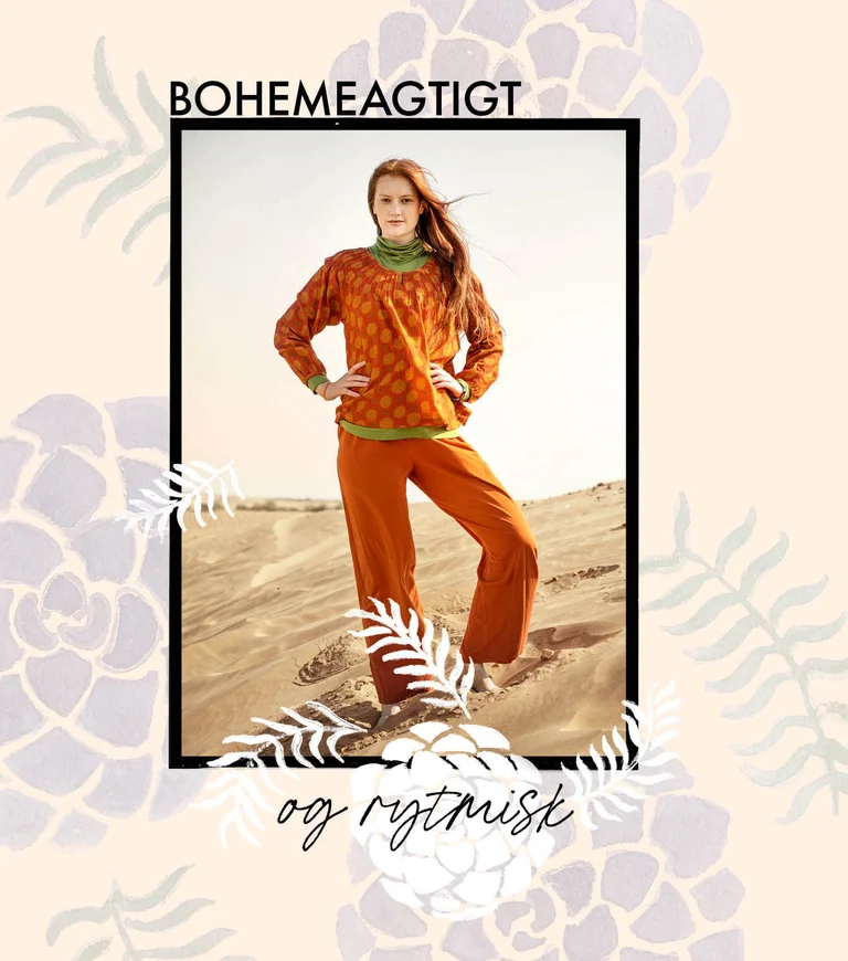 A woman wearing a patterned blouse and orange pants from Gudrun Sjödén.