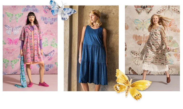 Women wearing colorful, butterfly-patterned Gudrun Sjödén outfits in both outdoor and decorative settings.