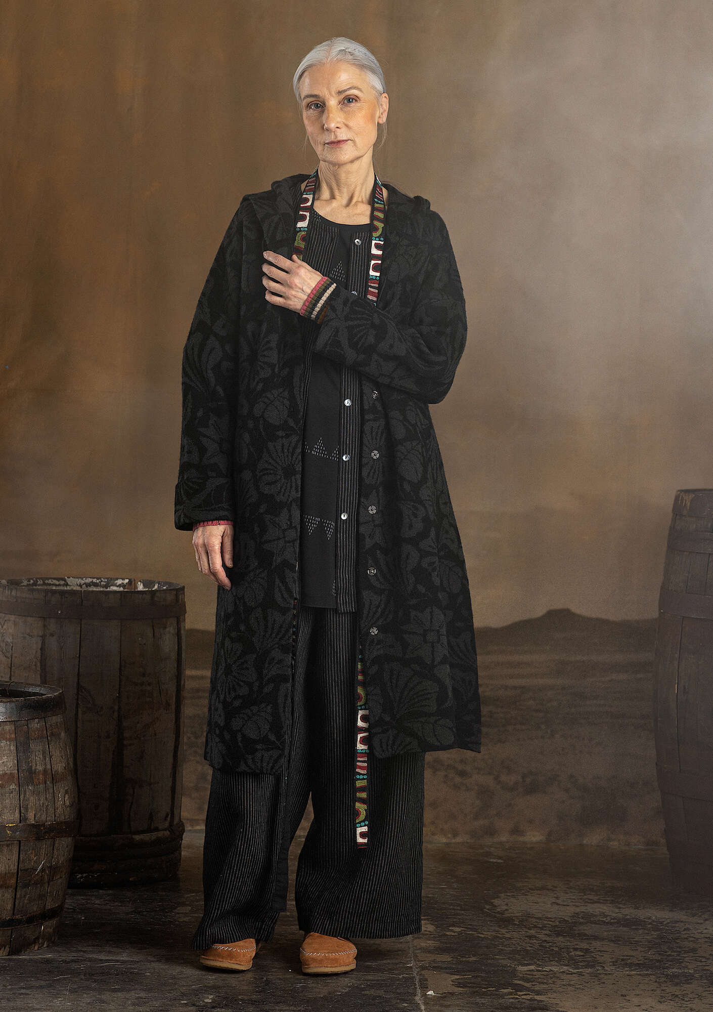 “Wind” knitted coat crafted from felted organic wool black thumbnail