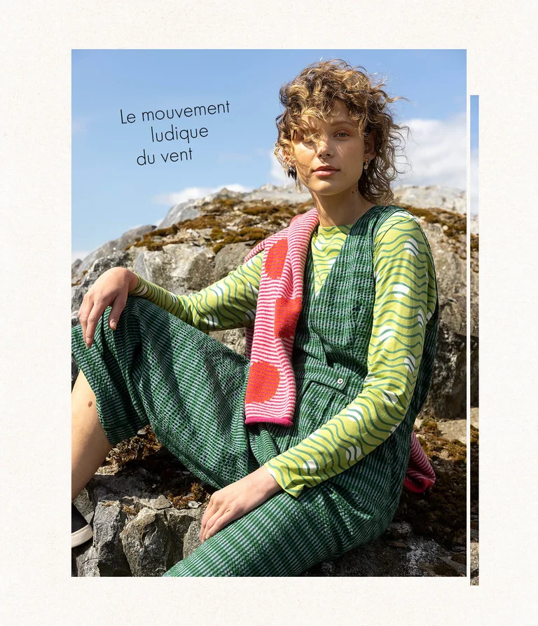 A woman wearing a green jumpsuit from Gudrun Sjödén. 