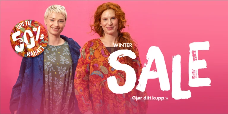 Two women wearing colourful clothes from Gudrun Sjödén.