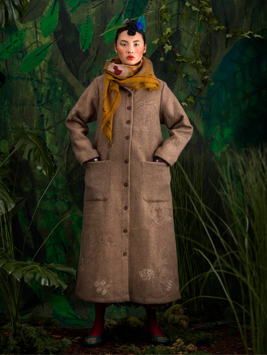 Embroidered wool coat with a truly elegant, long flowing silhouette. 