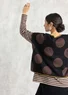 “Rut” knitted top in a blend of organic and recycled cotton (black/dot S)