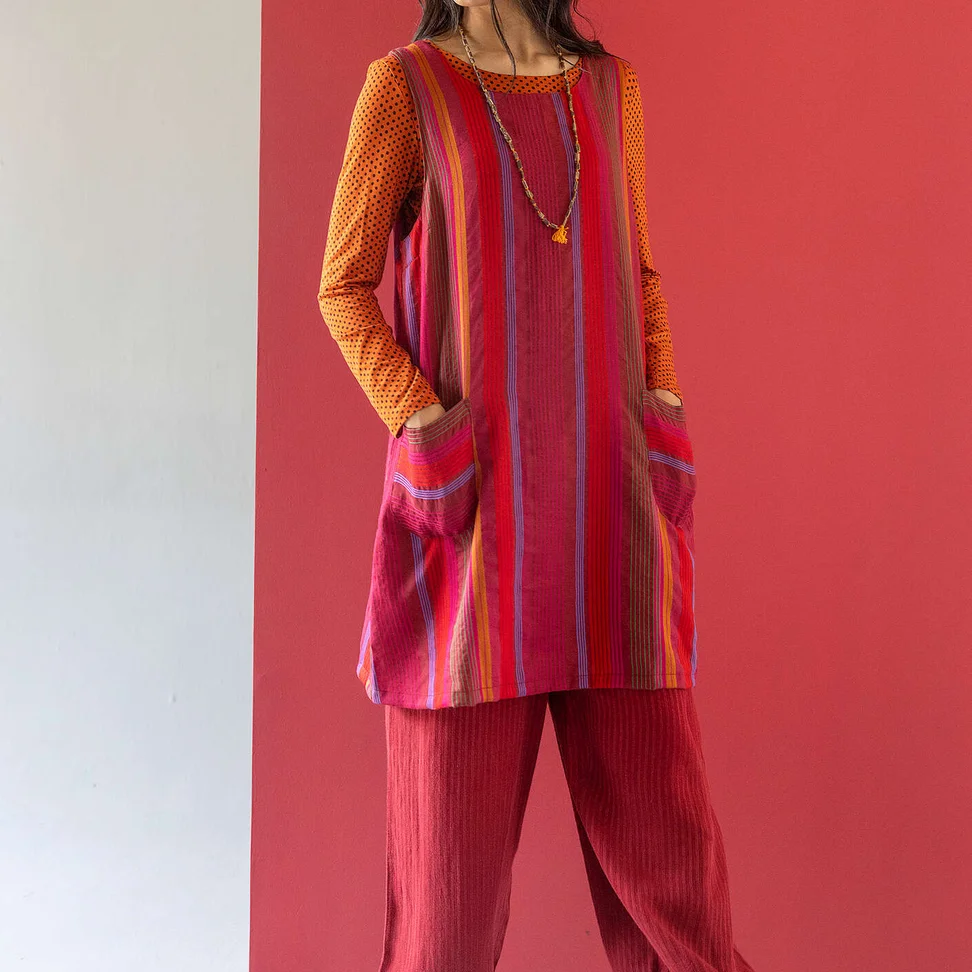 “Ketchi” woven jumper dress in wool/cotton - pomegranate