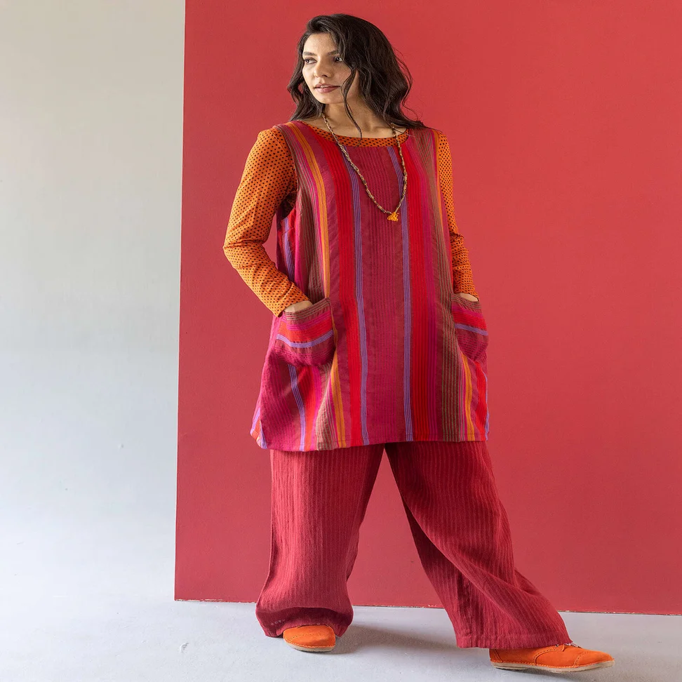 “Ketchi” woven jumper dress in wool/cotton - pomegranate