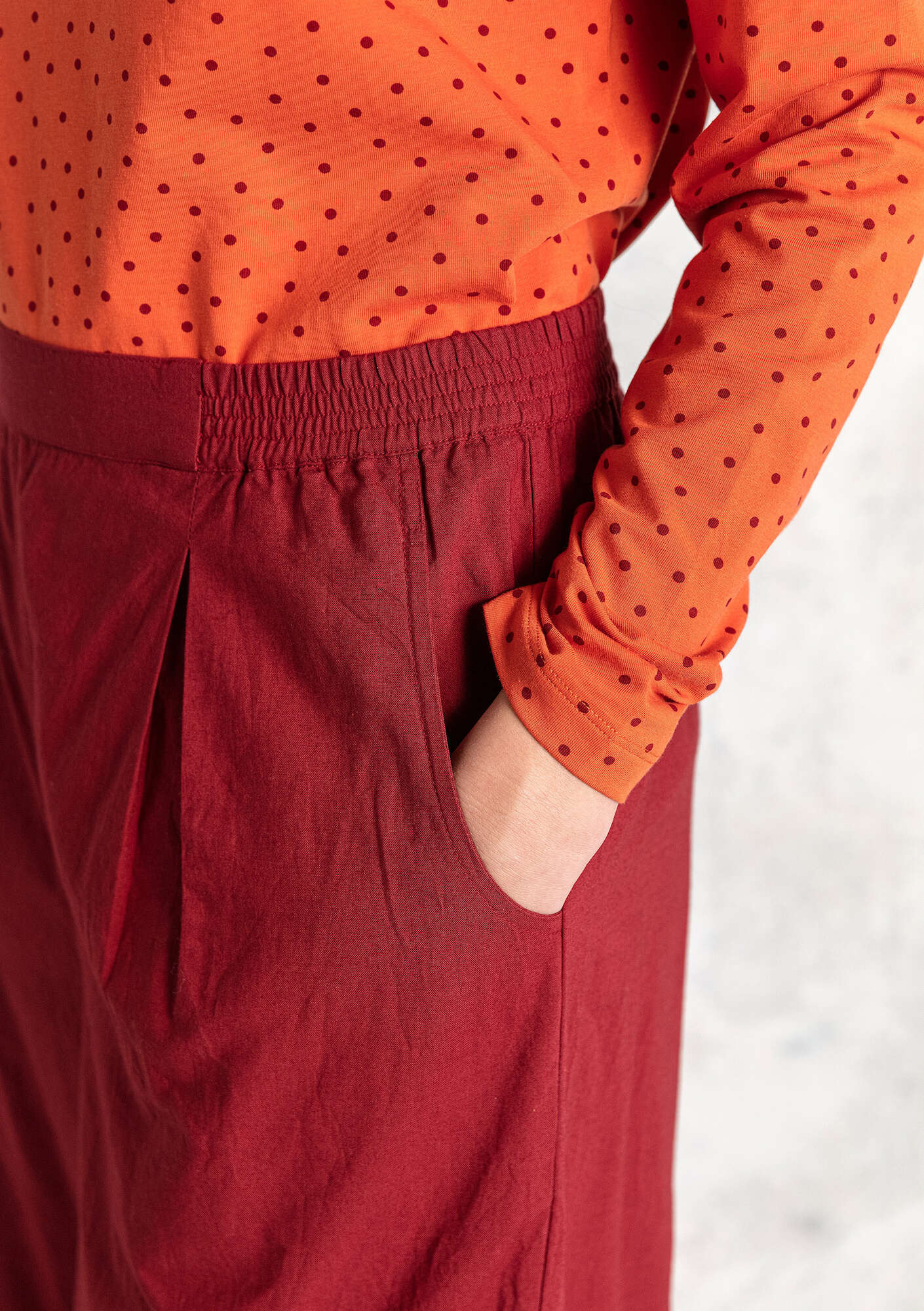 “Hi” woven organic cotton trousers agate red