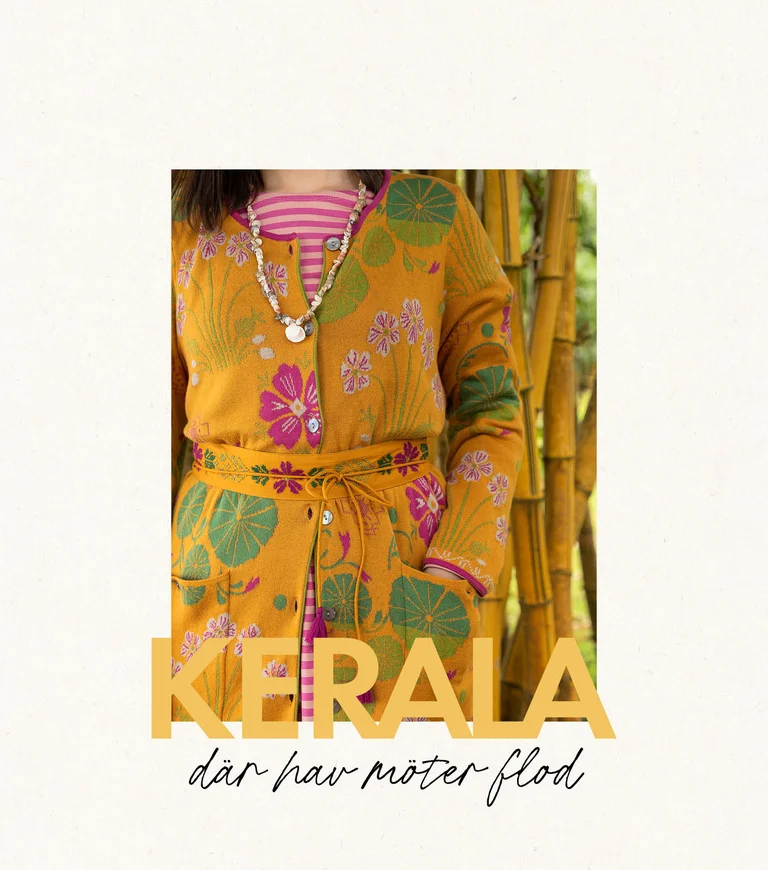 A woman wearing a patterned dress and an open dress from Gudrun Sjödén. 