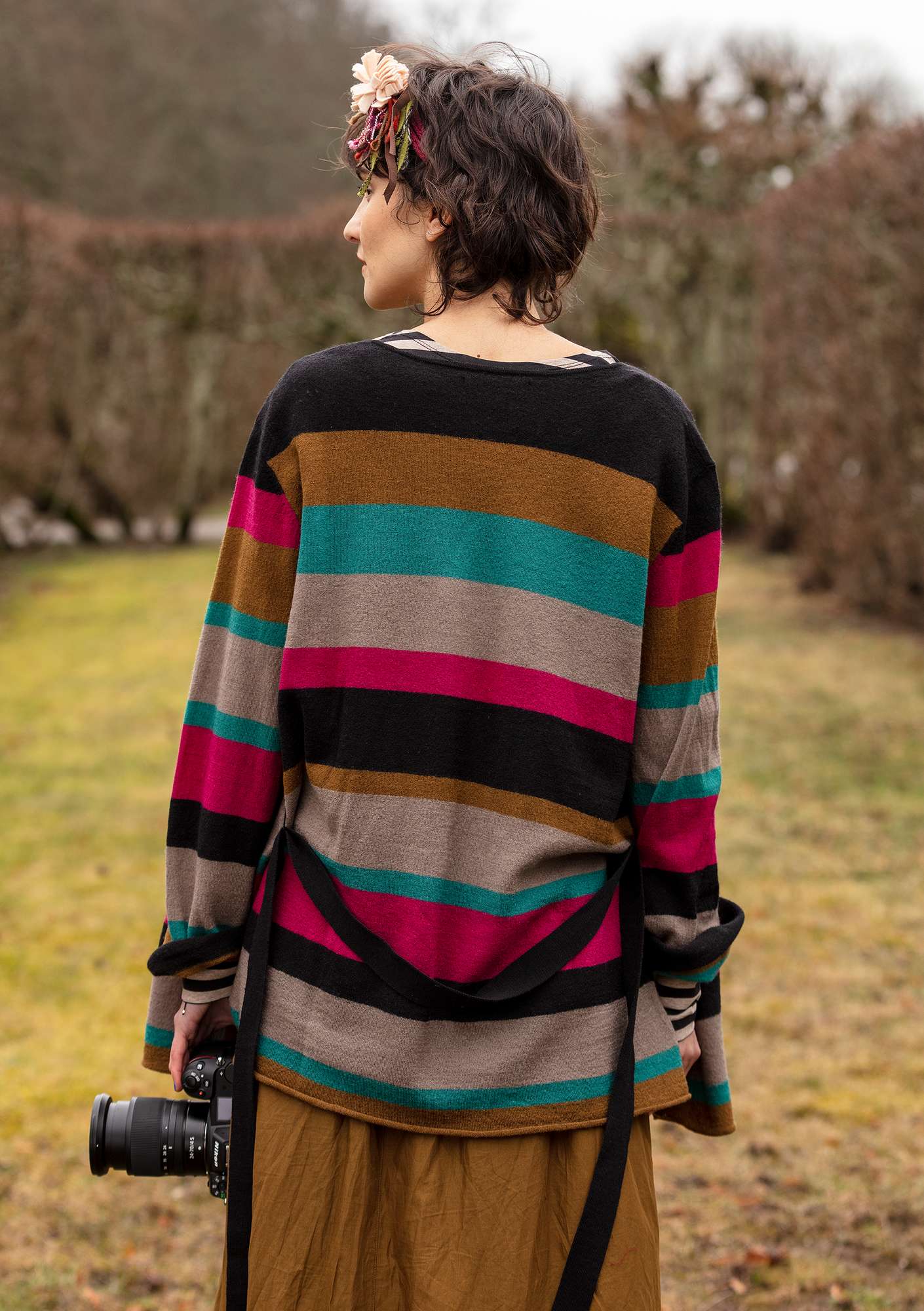 Solid-colour and striped wraparound cardigan crafted from felted wool patterned/black