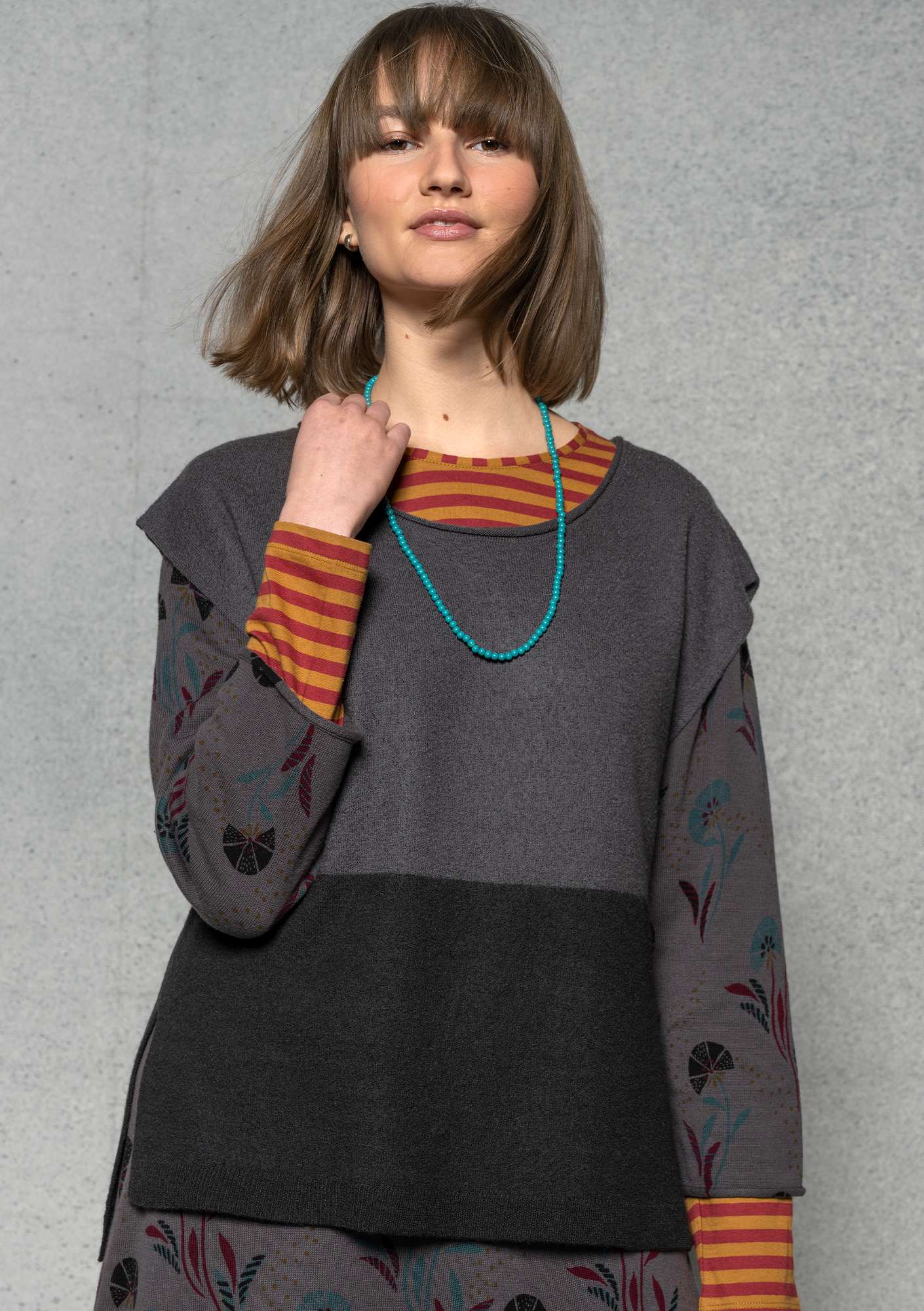 Knitted organic wool waistcoat ash grey-black thumbnail