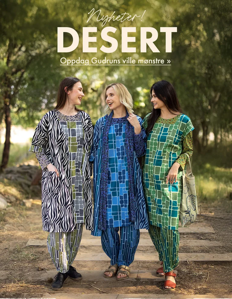 Three women standing next to each other outdoors wearing patterned clothes from Gudrun Sjödén.