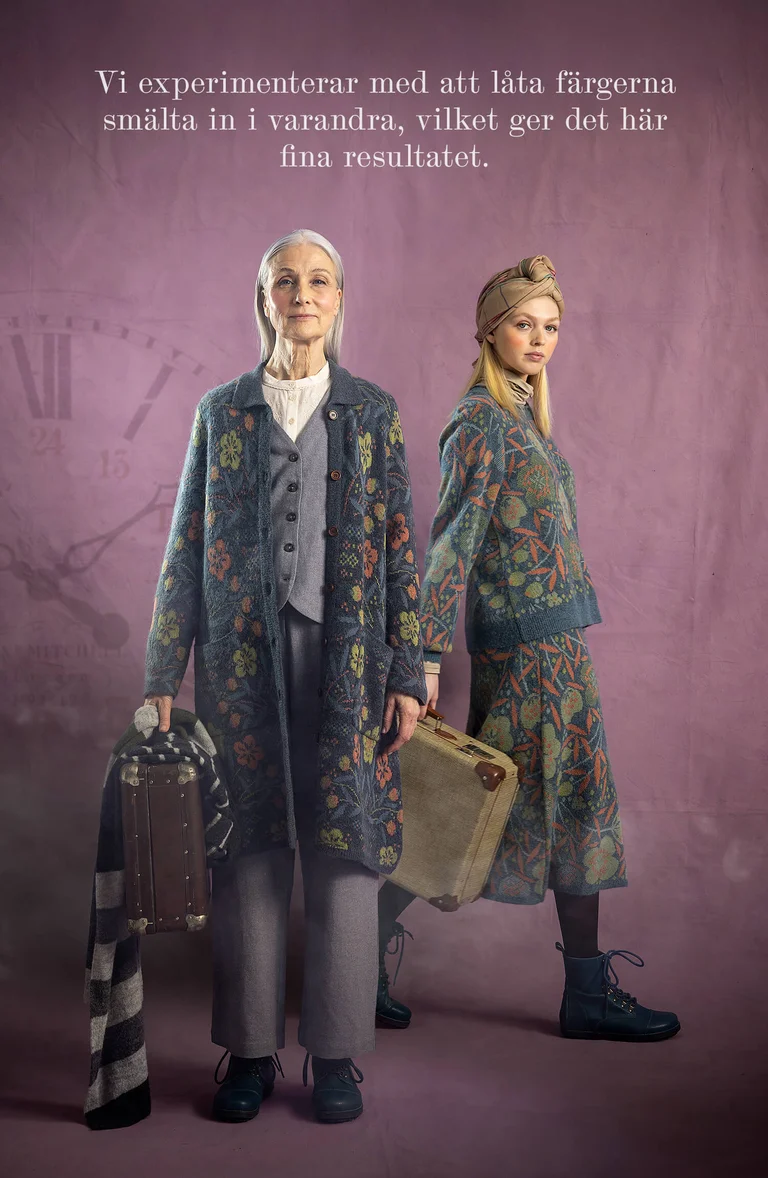Two women with suitcases in their hands wearing layers of clothing from Gudrun Sjödén.