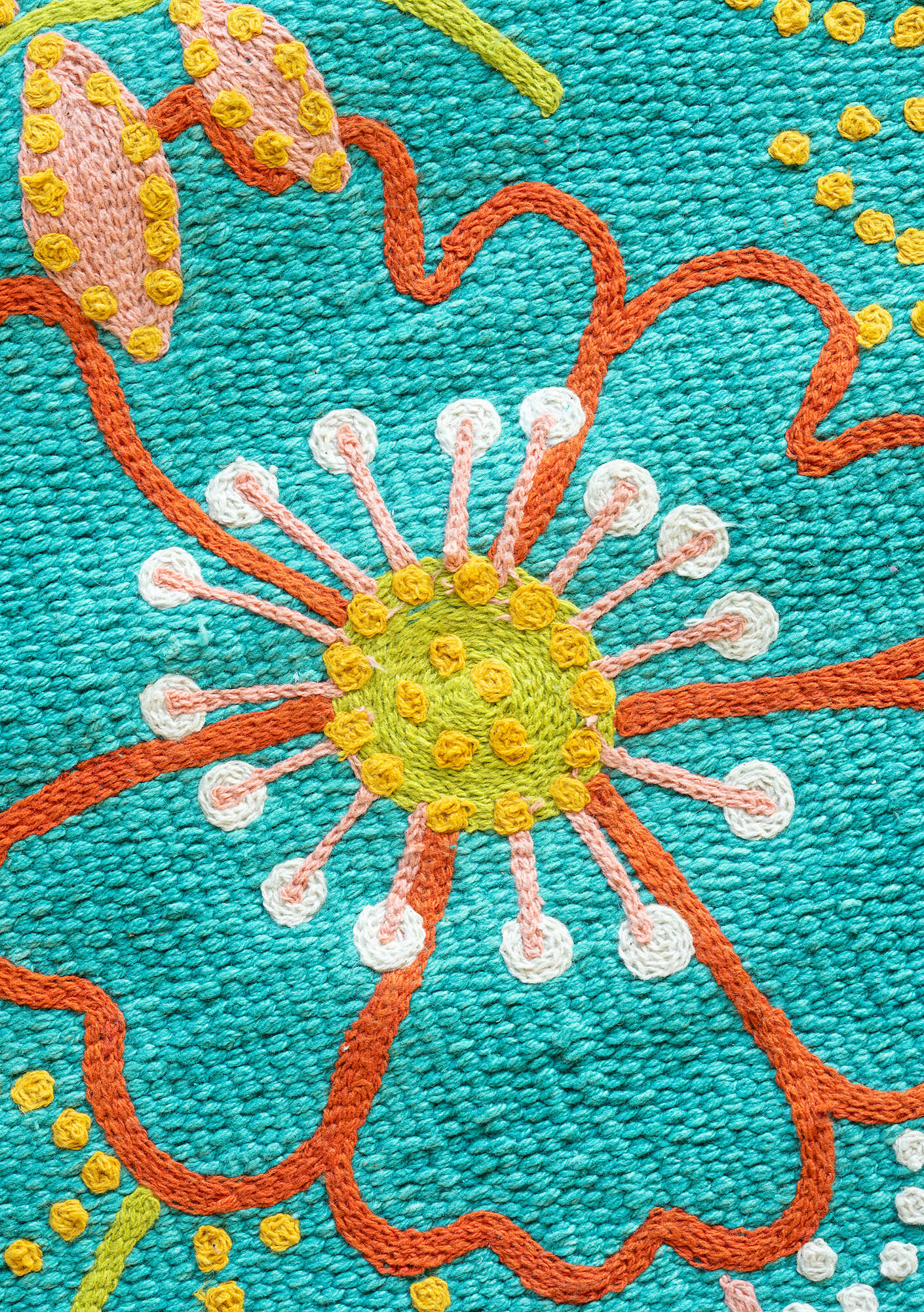 Embroidered “Vera” rug in organic cotton  pale orient green thumbnail
