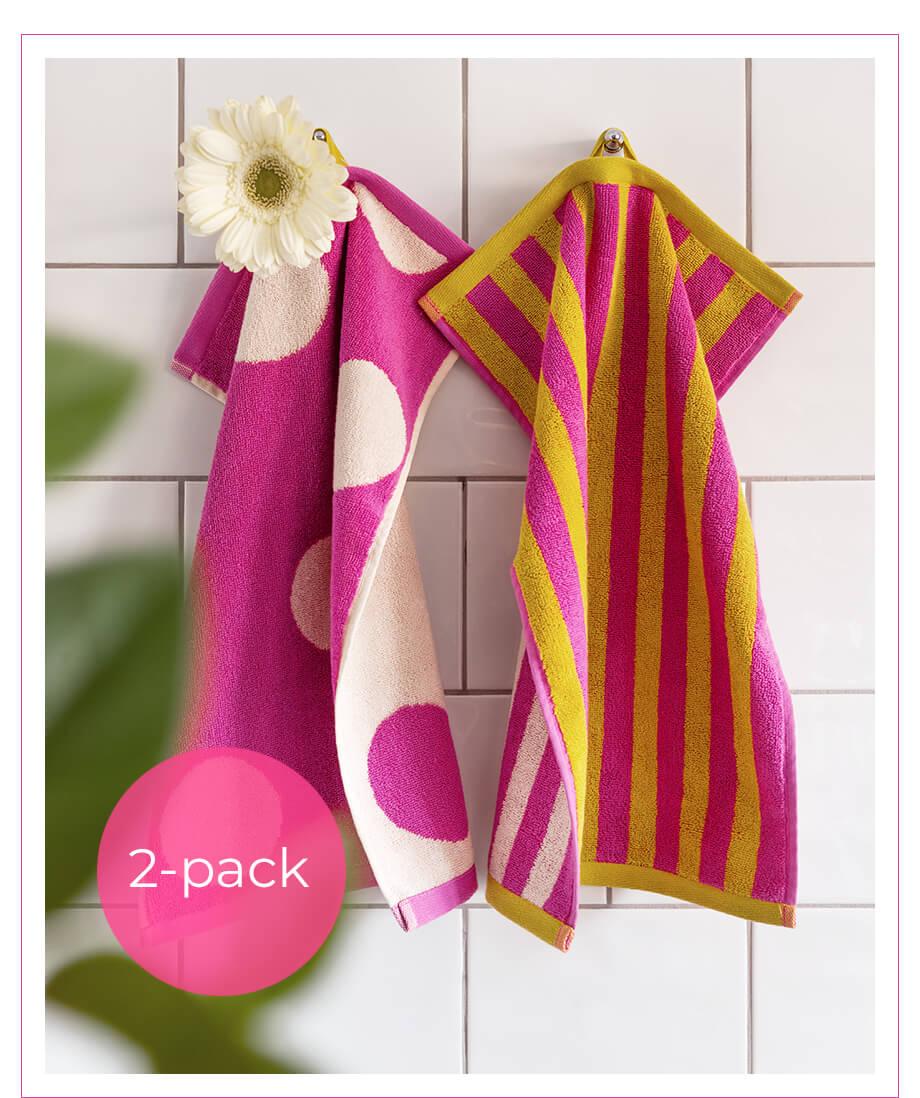 This charmingly mismatched pair of guest towels is just the thing.