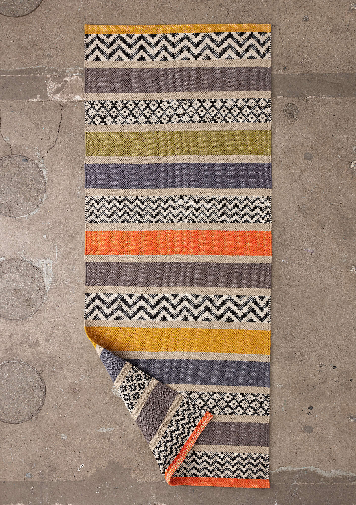 Striped rug in organic cotton dark nature thumbnail