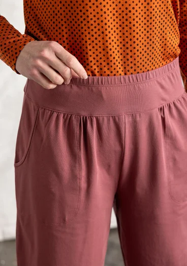 Organic cotton/elastane jersey trousers - dusty red