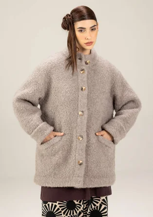 Strikket jakke i ullbouclé - lys potet/meleret