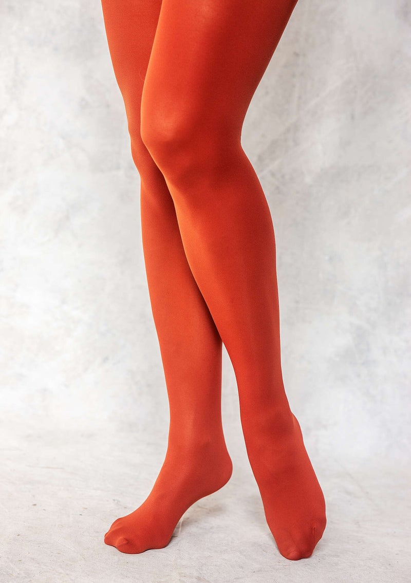 Solid-color tights in recycled nylon rust