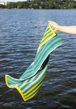 Serviette "Sunset" en coton biologique - vert verre de mer