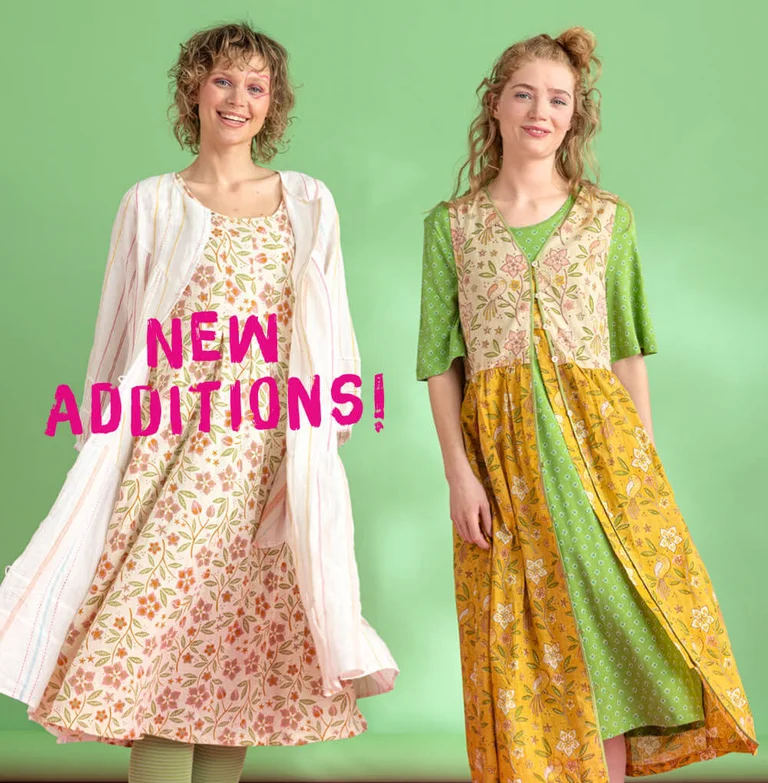 Two women wearing dresses from Gudrun Sjödén. 