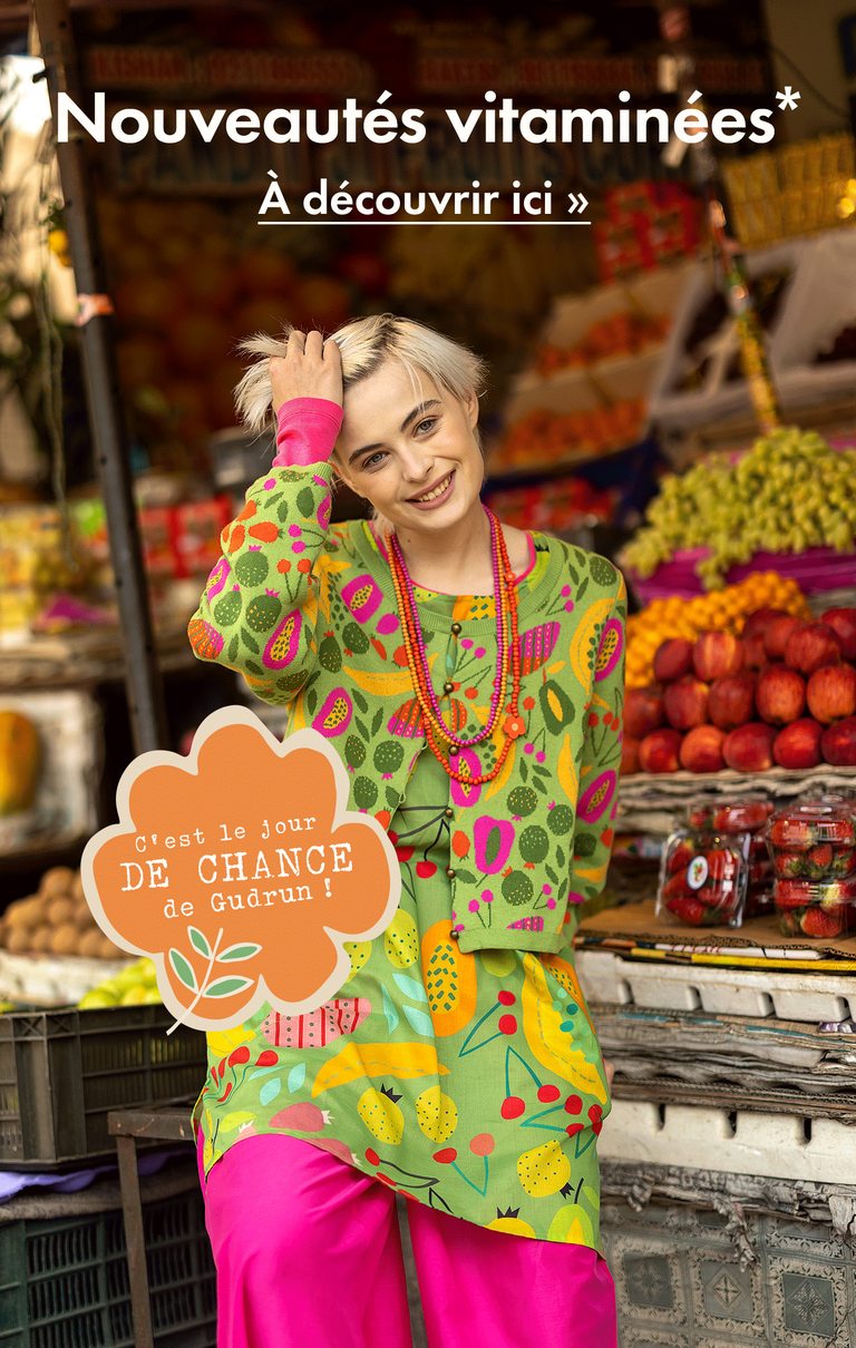 Un collage de photos représentant beaucoup de fruits et une femme portant des vêtements Gudrun Sjödén aux motifs de fruits dans des coloris vifs.