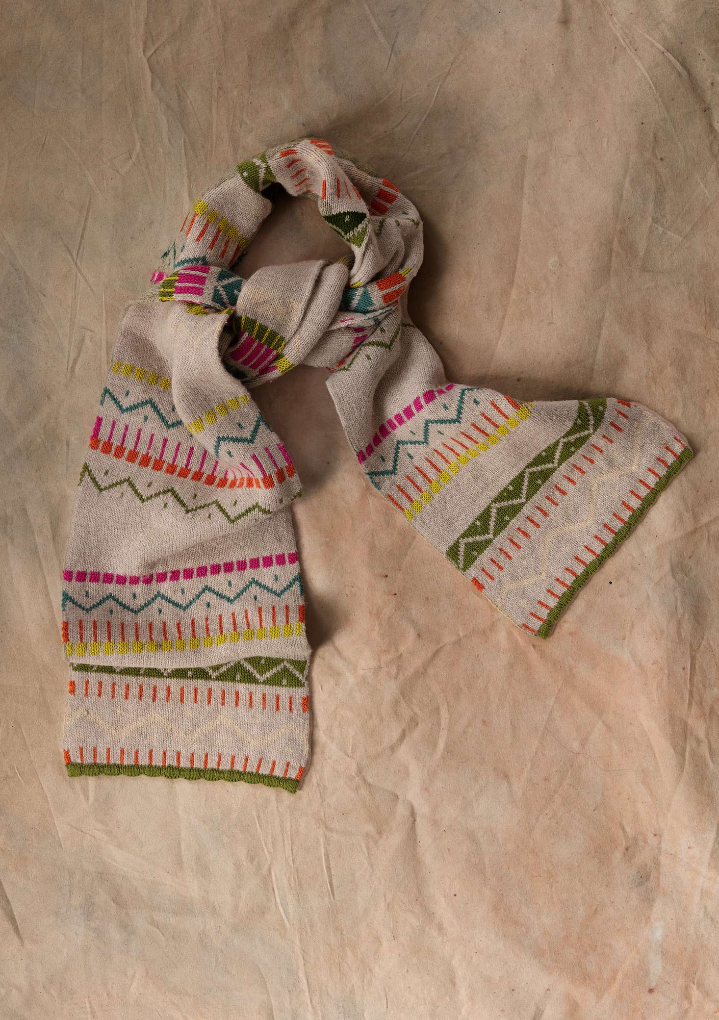 “Strikk” knitted scarf in a wool/hemp/recycled cotton blend natural melange