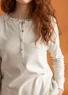 Pull à col tunisien en coton biologique côtelé (plumes XXL)