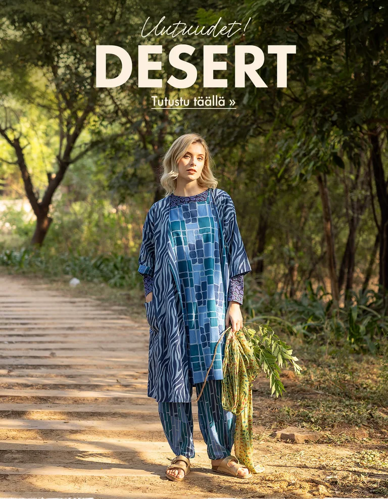 Three women standing next to each other outdoors wearing patterned clothes from Gudrun Sjödén.