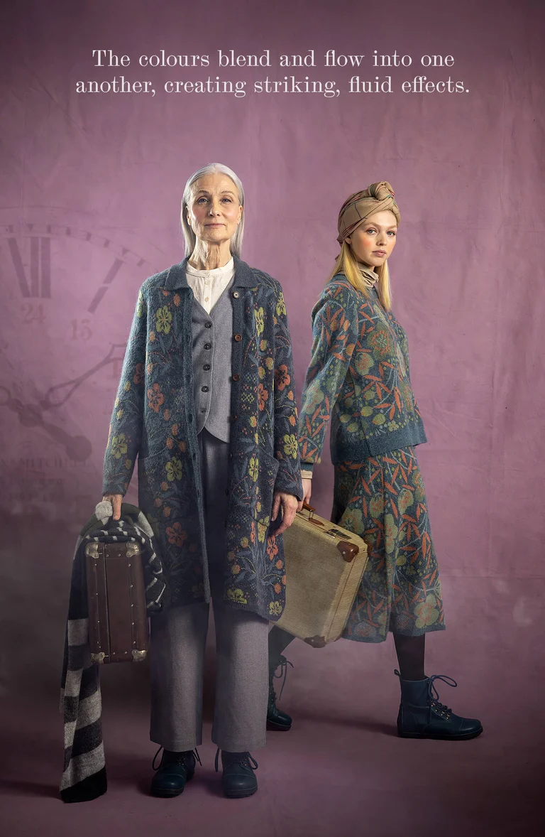 Two women with suitcases in their hands wearing layers of clothing from Gudrun Sjödén.