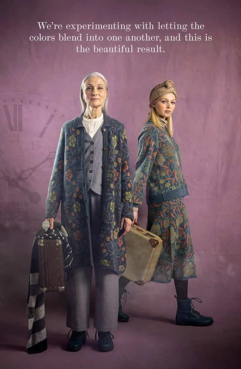 Two women with suitcases in their hands wearing layers of clothing from Gudrun Sjödén.