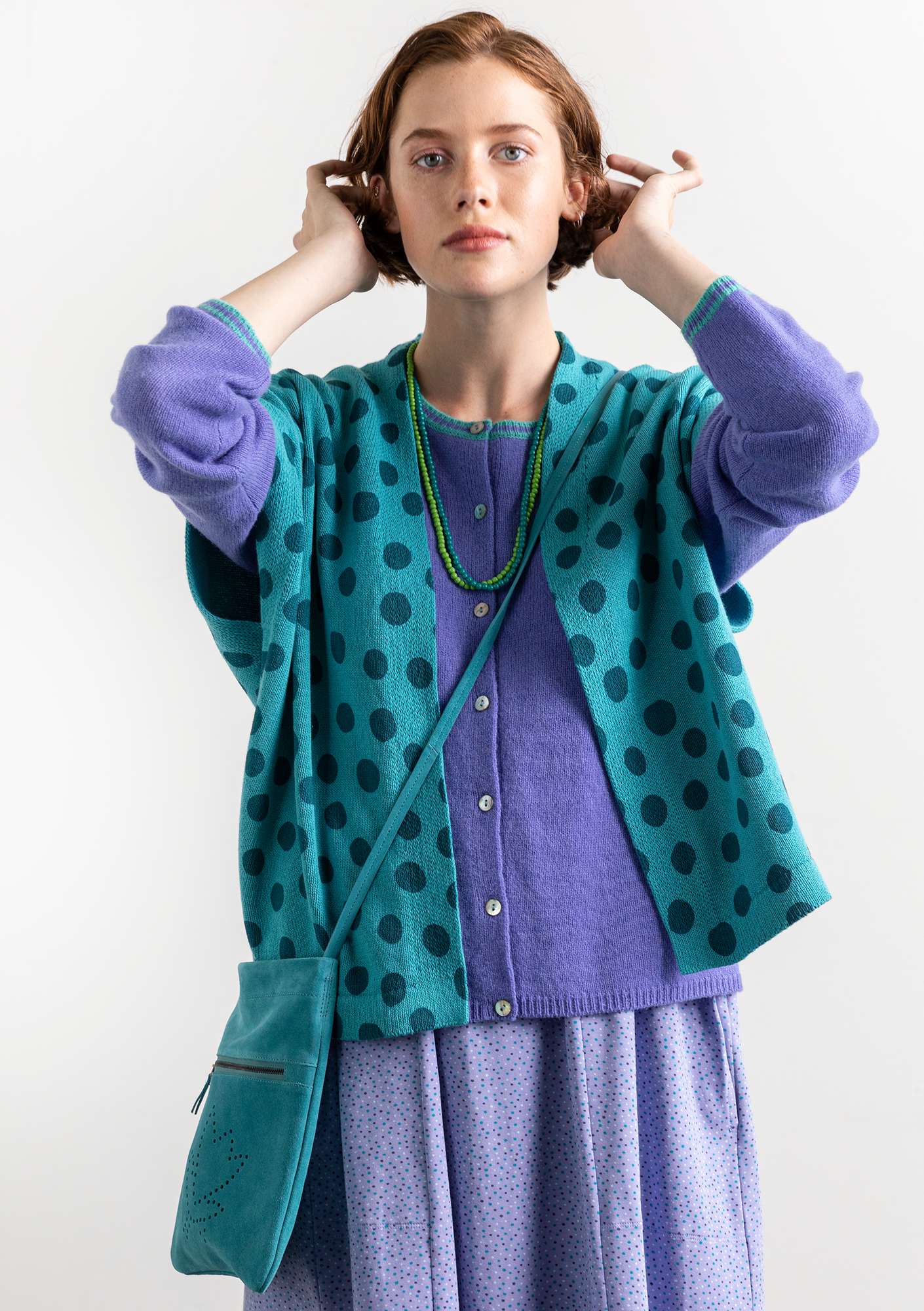 “Cordelia” knitted waistcoat in recycled cotton turquoise/petrol blue