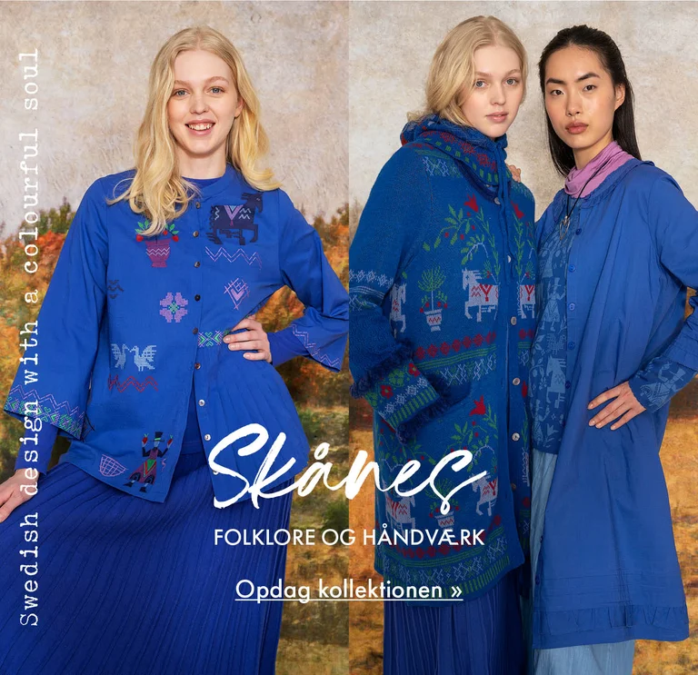 A collage with three photos of: two women wearing folk-art patterned clothes, a close-up of a woman wearing a blue knitted balaclava with a floral pattern, and a woman wearing a blue embroidered blouse and blue skirt from Gudrun Sjödén. A painted autumnal landscape is visible in the background.