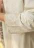 “Amisha” embroidered dress in a woven blend of organic cotton and linen (feather M)