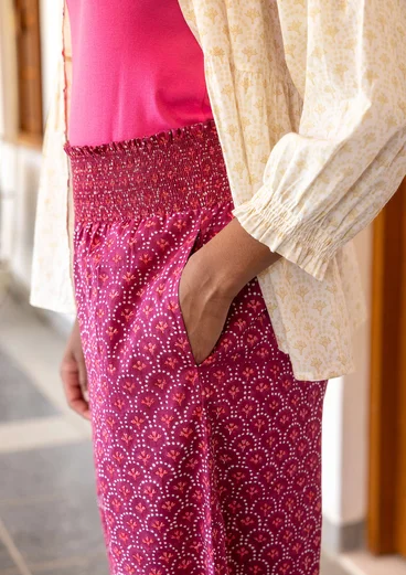 “Neela” woven organic cotton trousers - dark hibiscus
