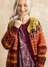 Gemusterte Strickjacke „Luleälven“ aus Lammwolle/Recycling-Wollgemisch (terracotta L)