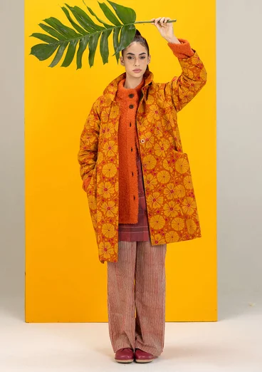 Strikket jakke i ullbouclé - grapefrukt/meleret