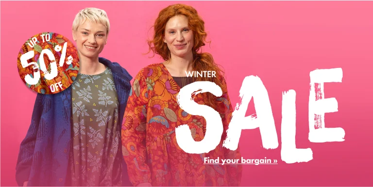 Two women wearing colourful clothes from Gudrun Sjödén.