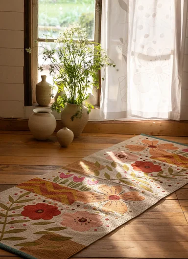 A patterned mat from Gudrun Sjödén in a home setting.