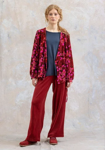 Pantalon "Cornus" en velours de coton biologique/polyester recyclé - rouge agate