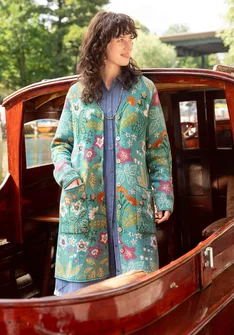 Cardigan à manches longues avec motif floral et boutons en bleu-vert.