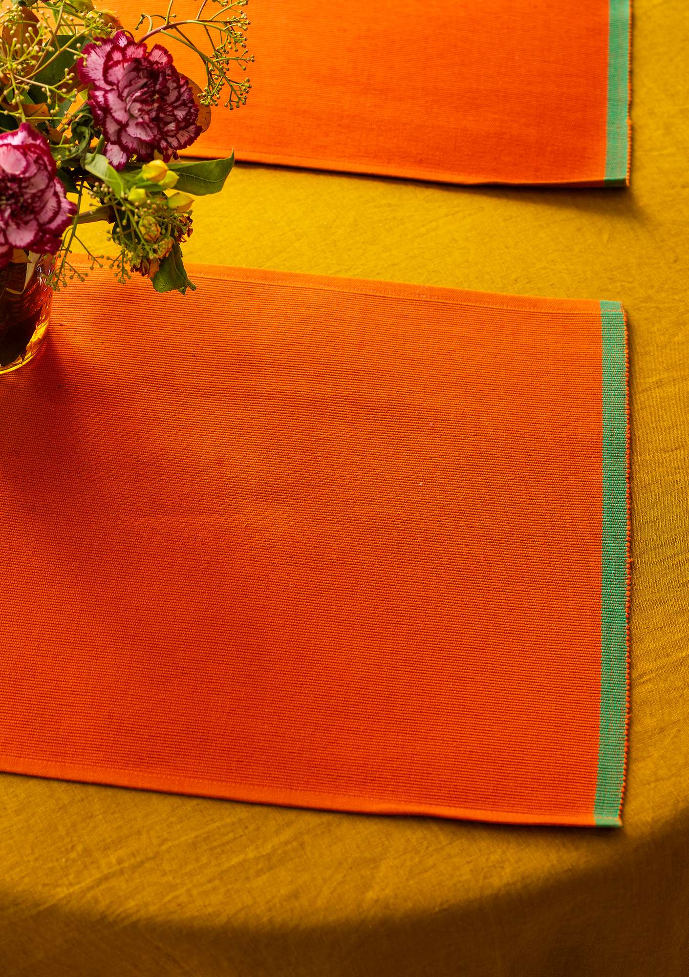 “Bolster” place mat in organic cotton  chili