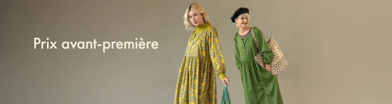 Deux femmes vêtues de vêtements Gudrun Sjödén posent sur un fond neutre, avec le texte 'Prix avant-première' à gauche.