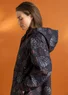 Veste de pluie ”Hedda” en coton biologique tissé (noir/motif S)