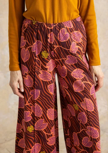 Pantalon à motif "Gul näckros" en coton biologique - aubergine