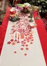 “Gnistra” table runner in organic cotton (tomato One Size)