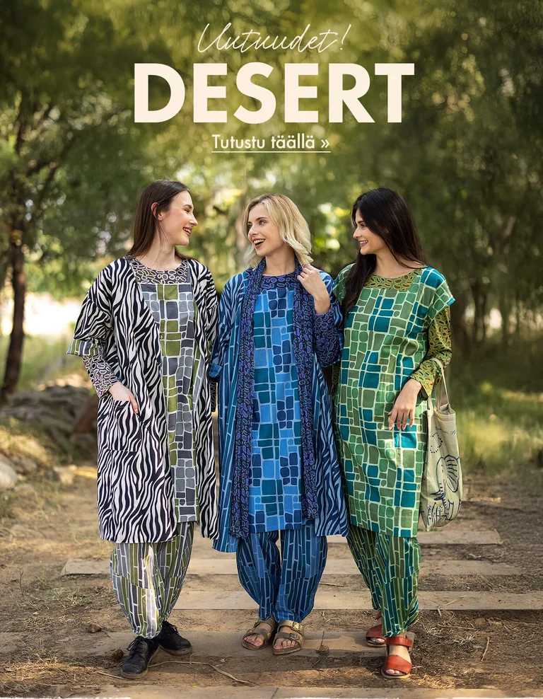 Three women standing next to each other outdoors wearing patterned clothes from Gudrun Sjödén.