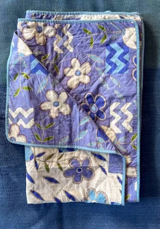 “Drömmar” organic cotton single bedspread - dark lavender