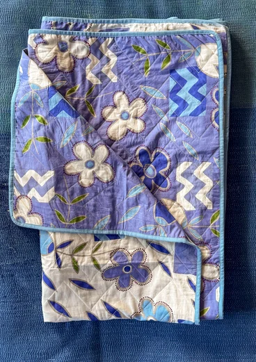 “Drömmar” organic cotton single bedspread - dark lavender