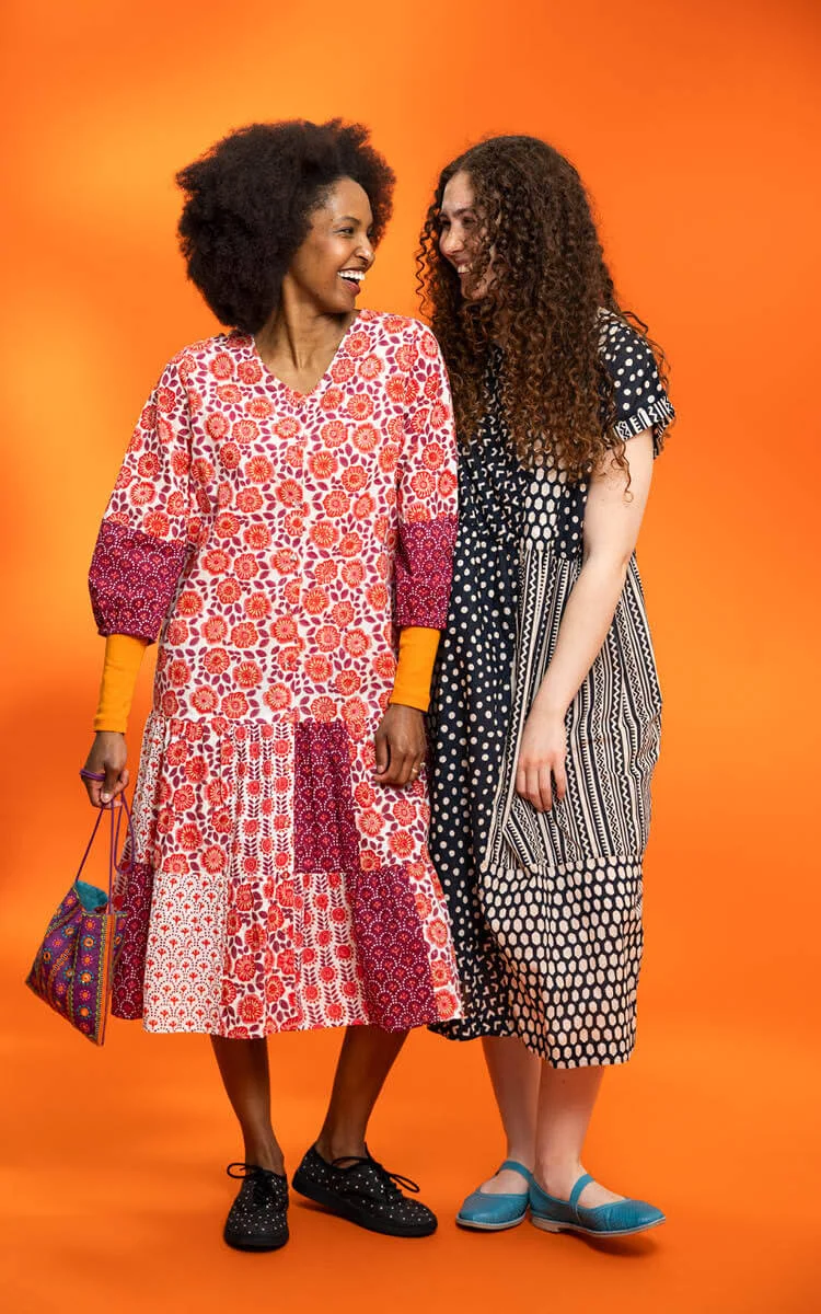 Two women wearing dresses from Gudrun Sjödén.