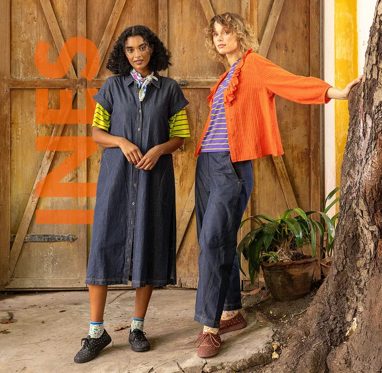 Two women wearing layers of clothes from Gudrun Sjödén.